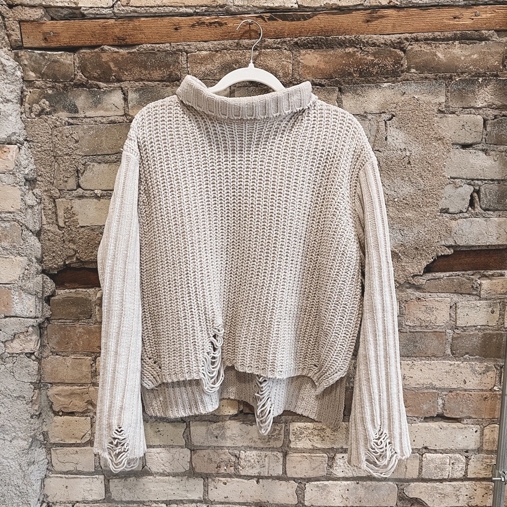 Distressed sweater